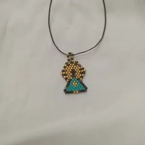 colgante virgen del pilar miyuki